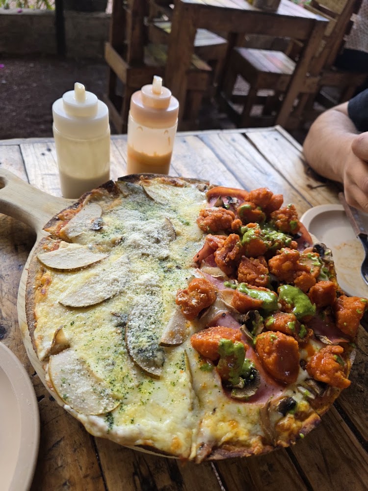 Pomorrois pizza a la leña