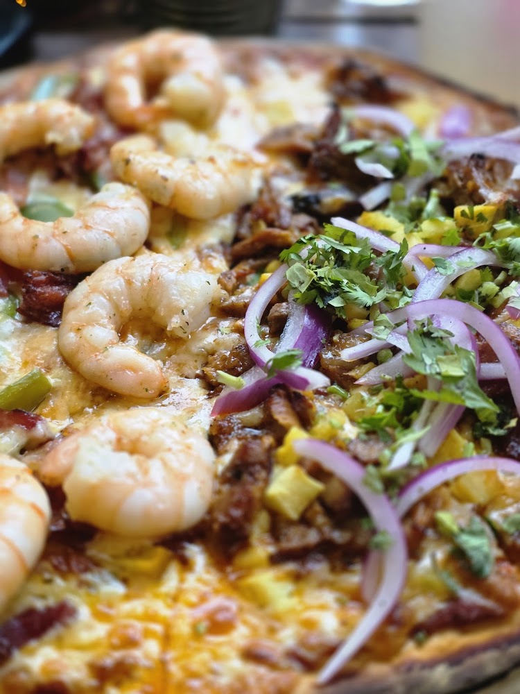 Pomorrois pizza a la leña