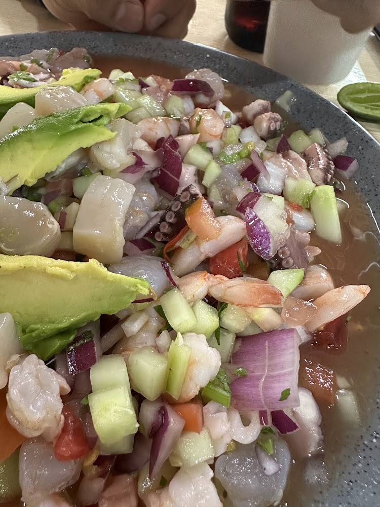 Mariscos El Memín · El Mesón