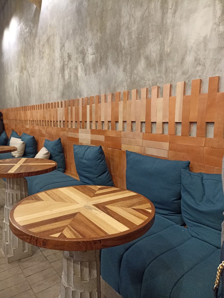Uno/Cien Café Estudio