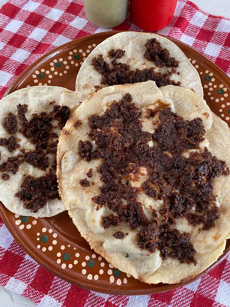 Wacakobba cabeza de res a la leña
