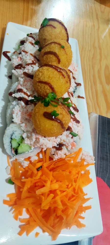 El Ausente alitas y sushi