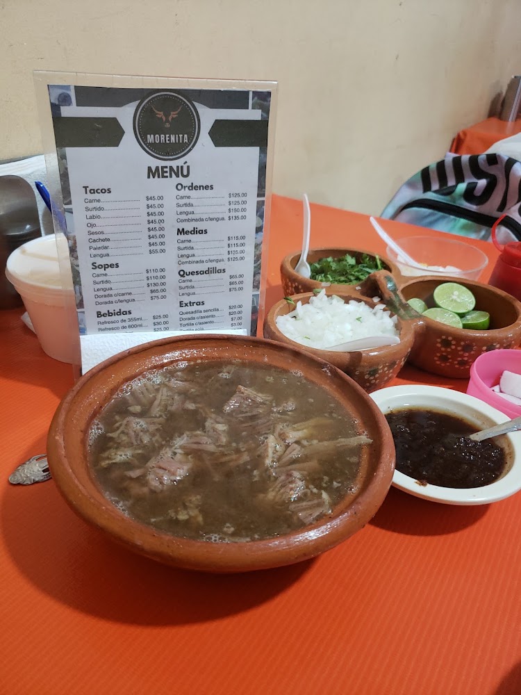 LA MORENITA CABEZA EN SU JUGO