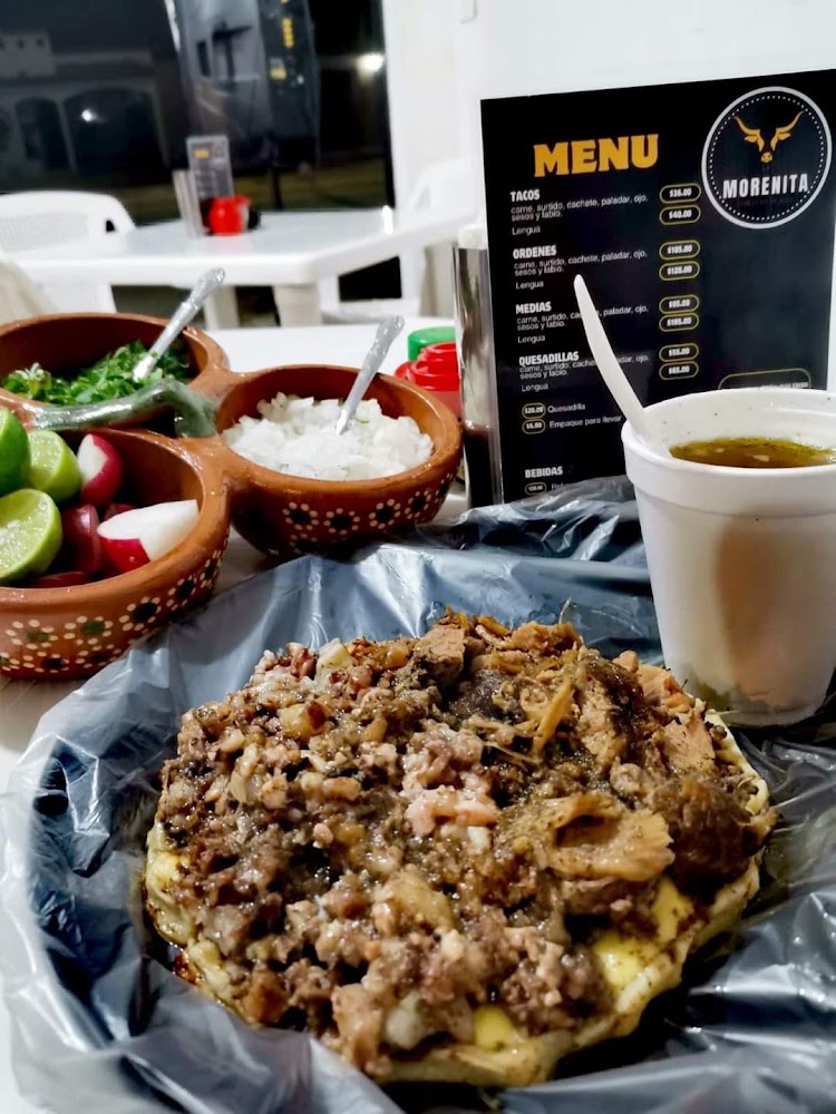 LA MORENITA CABEZA EN SU JUGO
