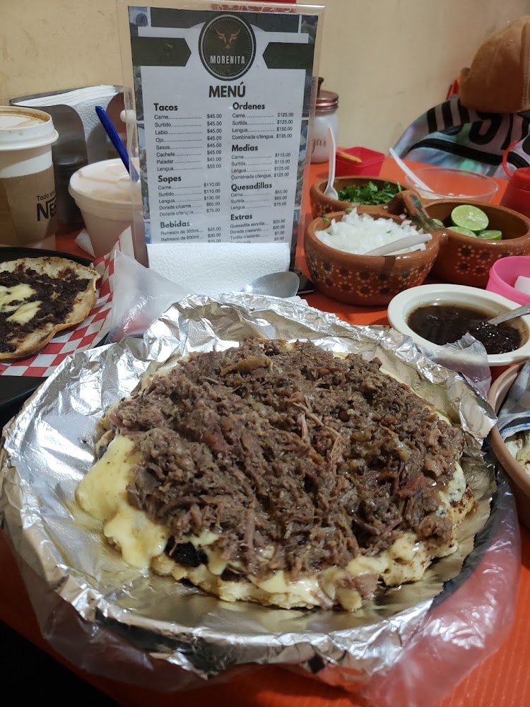 LA MORENITA CABEZA EN SU JUGO